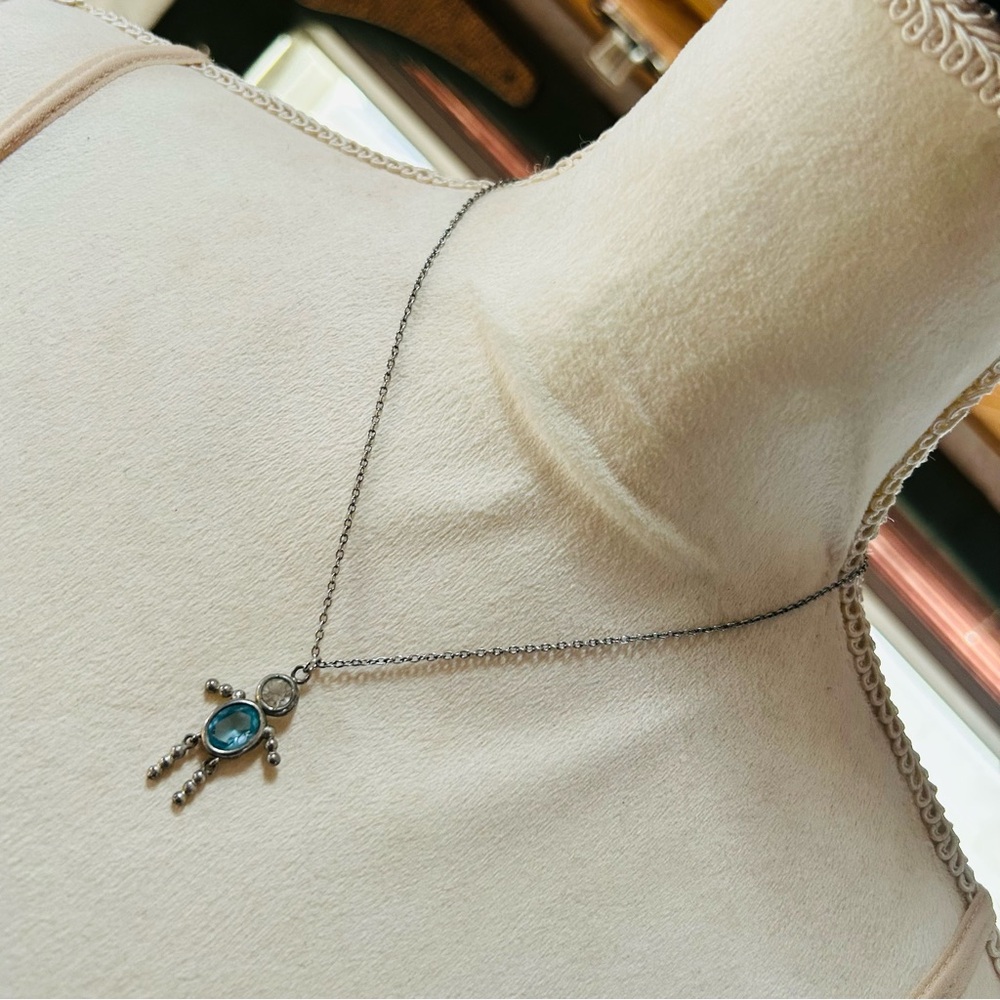 Vintage articulated leg crystal man pendant on chain necklace